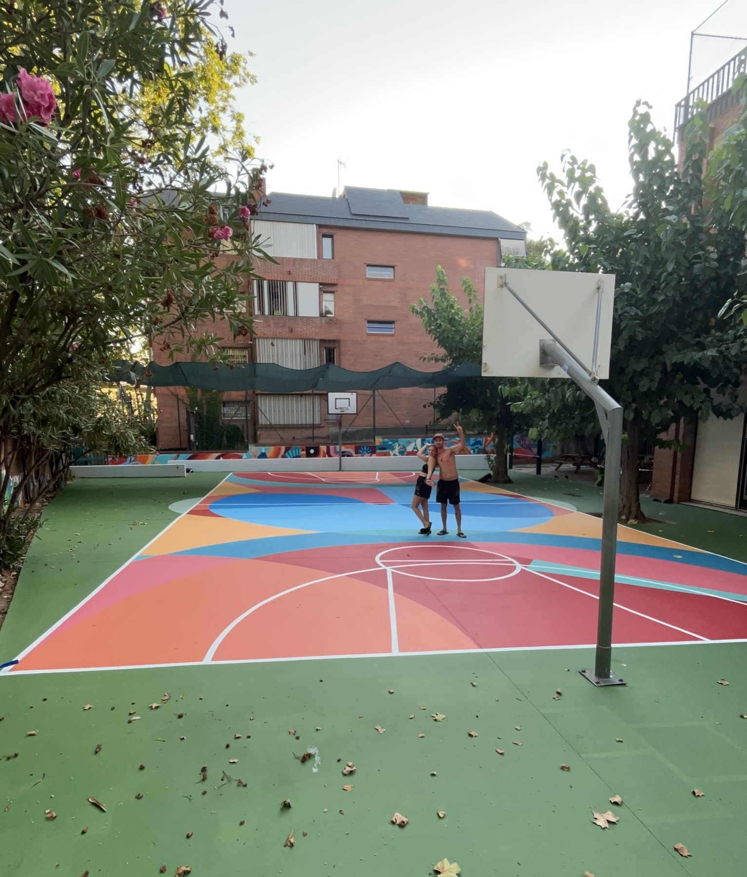 Outdoor school courtyard and sports-zone mural