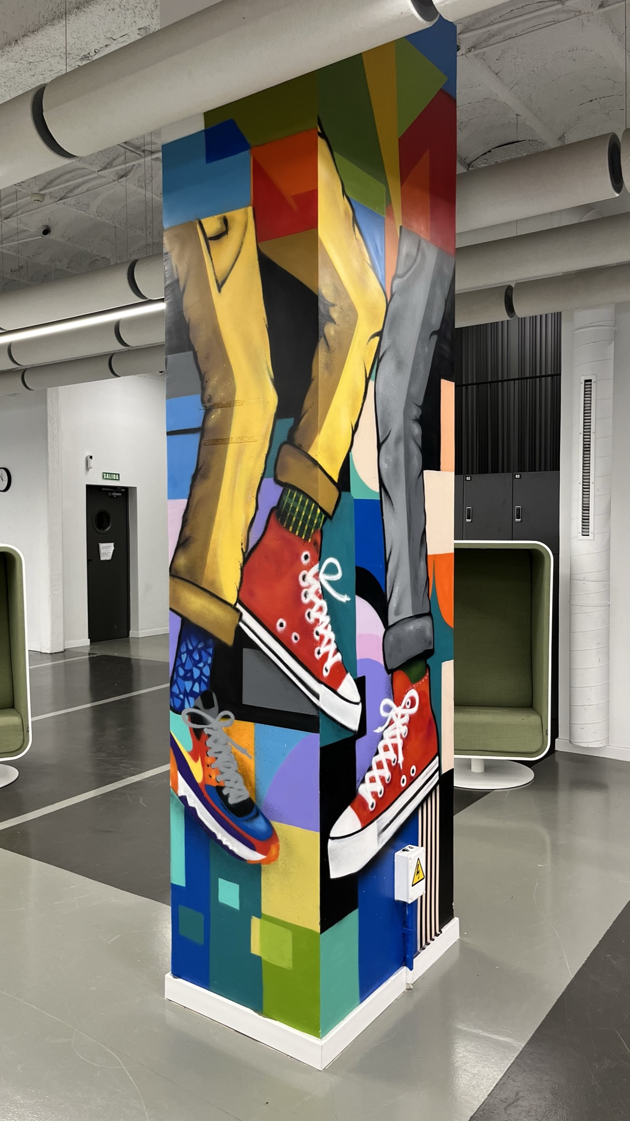 Tall painted panel with bold figurative shapes